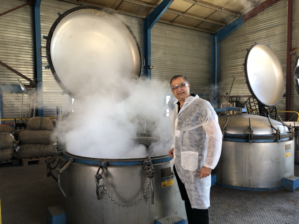Puneet Nanda at a steam distillation facility for essential oils