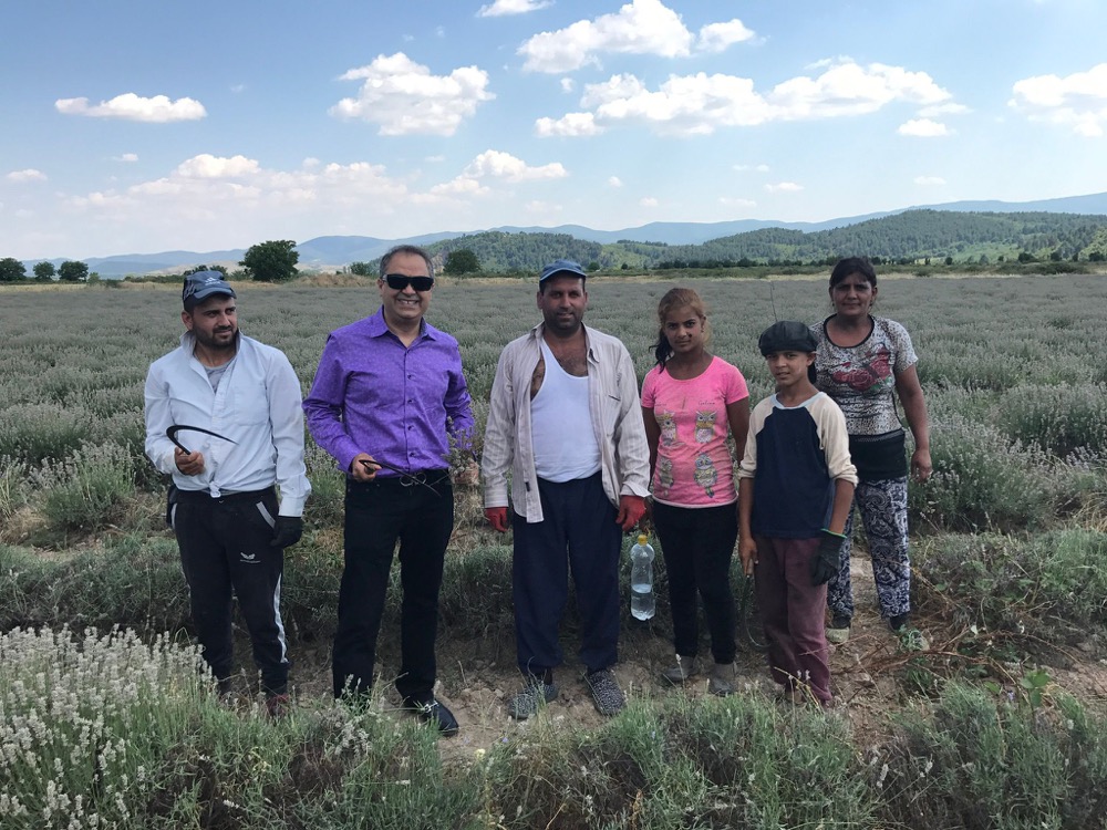 Puneet Nanda with lavender farmers in the field