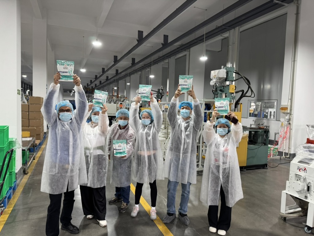 Puneet Nanda with the GuruNanda manufacturing team