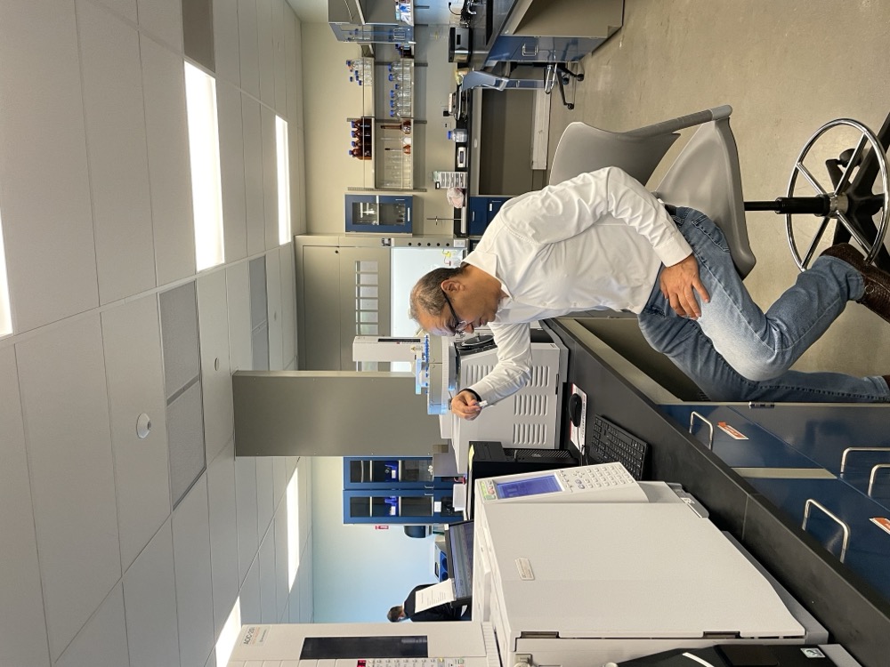 Puneet Nanda running quality control tests on lab equipment